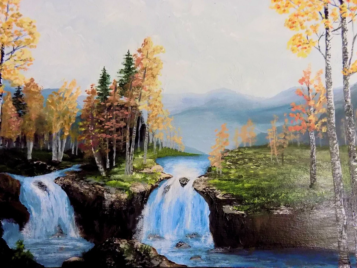 Paisaje otoñal con cascadas
